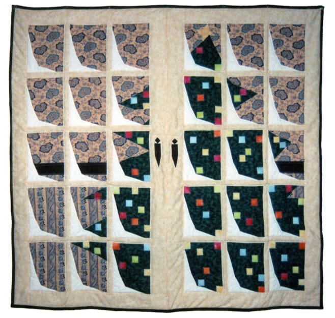 An art quilt of a christmas tree with colorful lights as seen through a set of snowy french door windows
